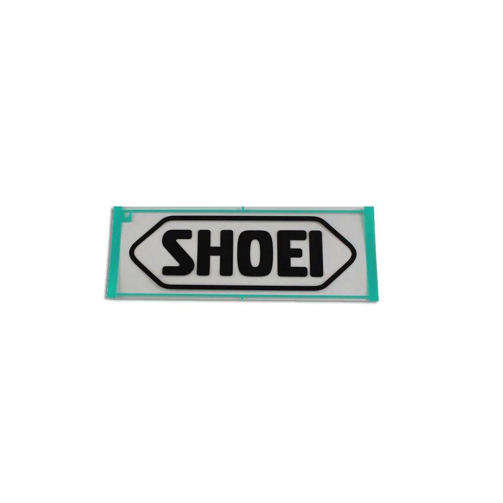 RECAMBIO SHOEI LOGO FRONTAL 82MM RJ PLATINUM-R / S-20 NEGRO MATE -