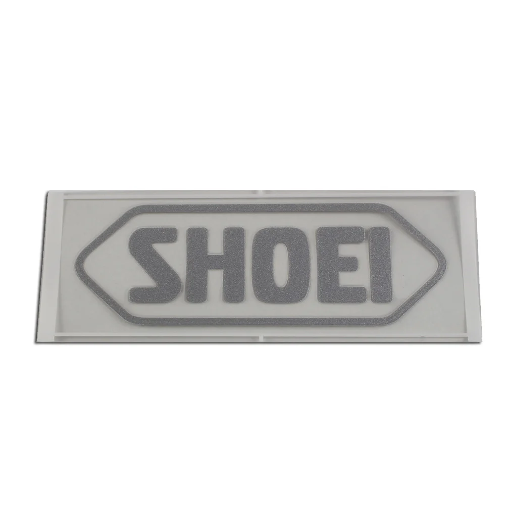 RECAMBIO SHOEI LOGO FRONTAL 95MM GRIS PLATA -