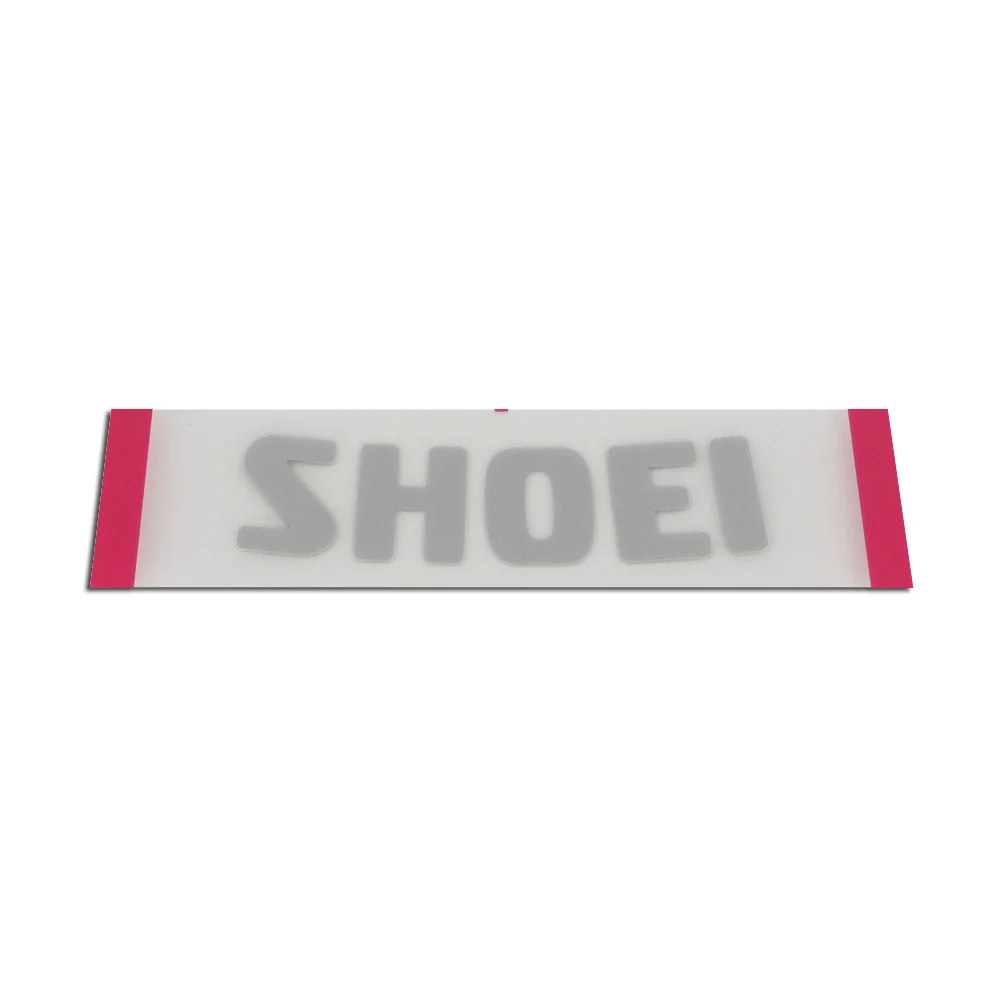 RECAMBIO SHOEI LOGO FRONTAL GLAMSTER GRIS PLATA -