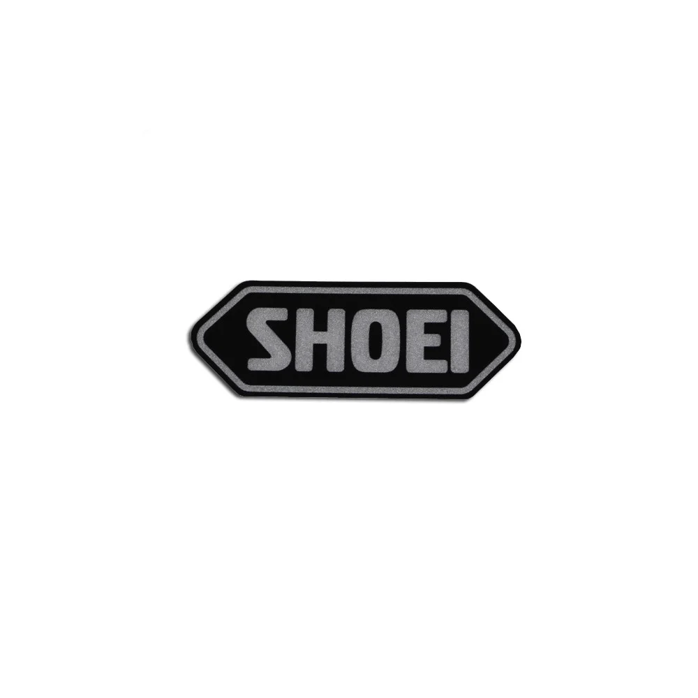 RECAMBIO SHOEI LOGO FRONTAL PEQUEÑO NEGRO / PLATA -